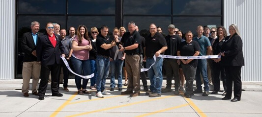 Ribbon cutting ceremony at the Ranew's Davenport, Iowa facility